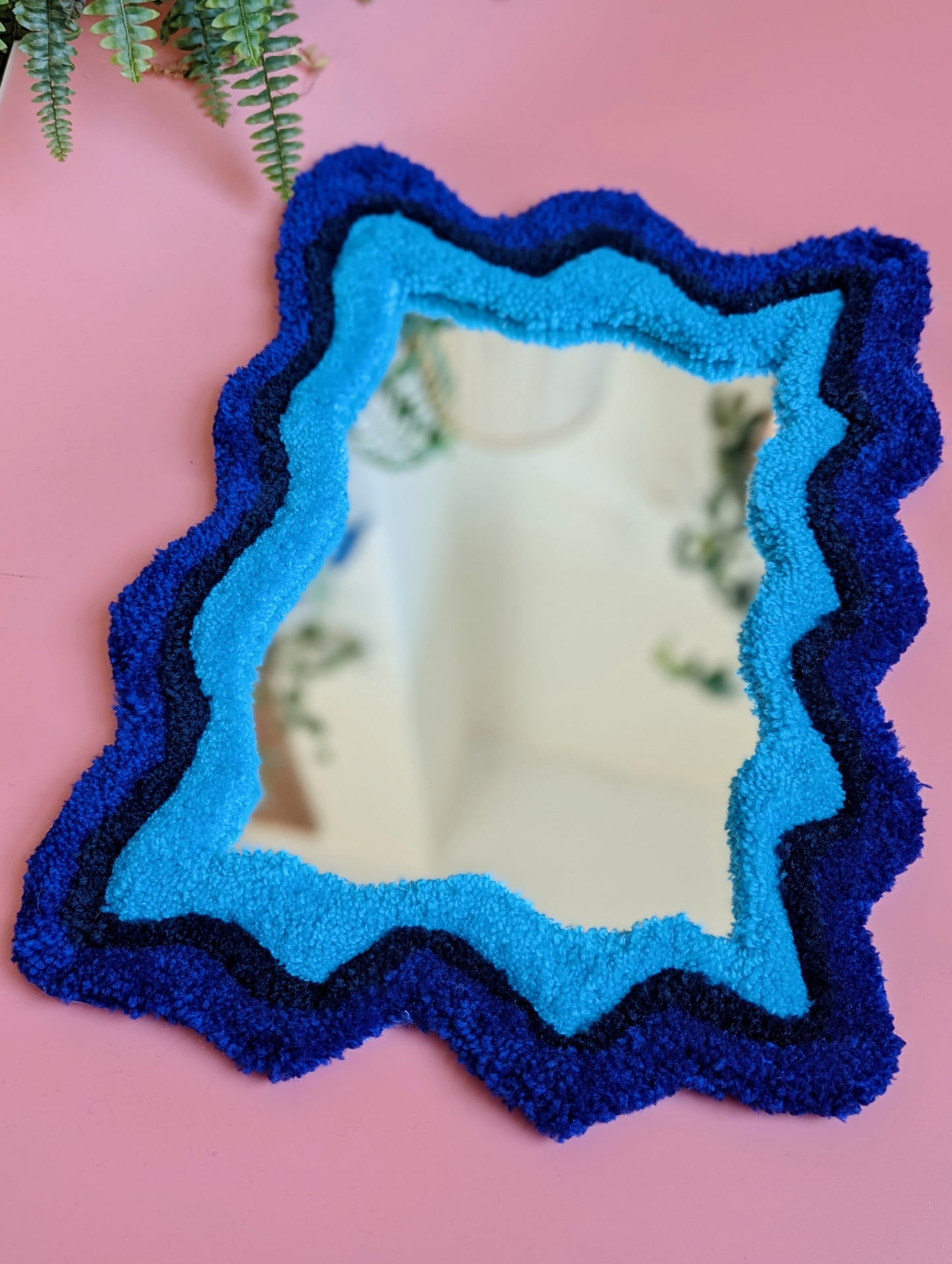 Blue coloured wavy pattern tufted yarn mirror