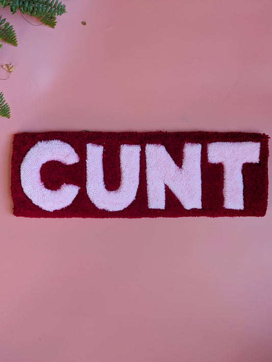 Red and pink c*nt tufted yarn wallhanging rug