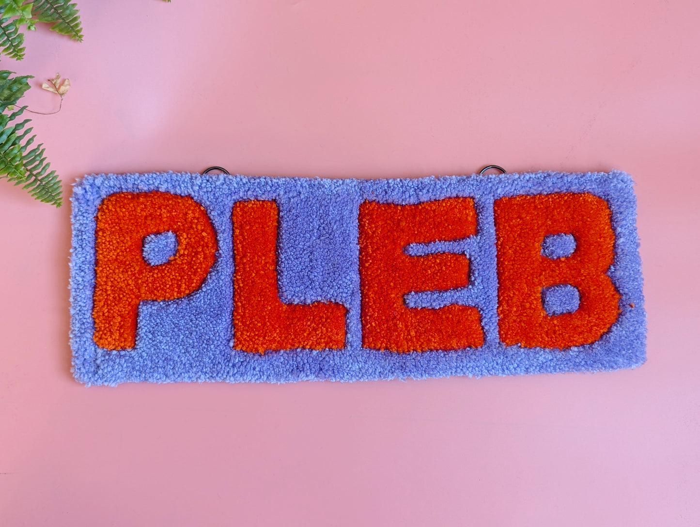 Purple and orange pleb tufted yarn wallhanging rug