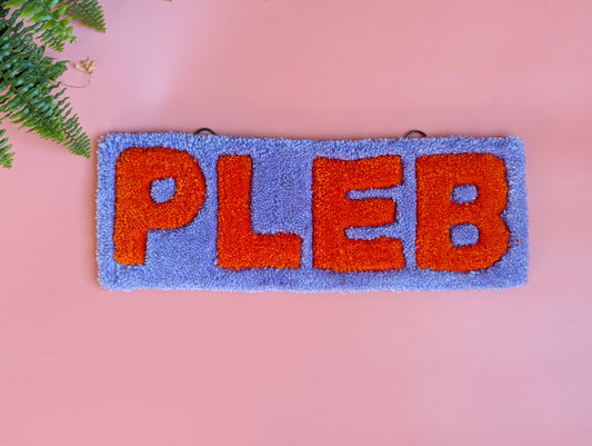 Purple and orange pleb tufted yarn wallhanging rug