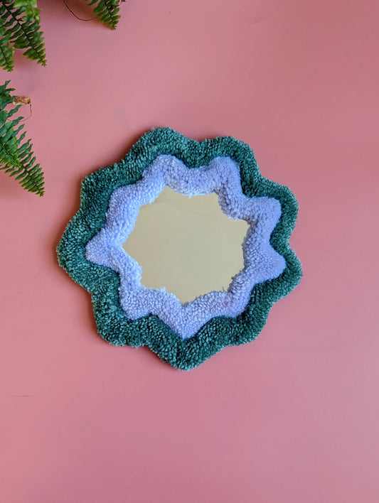 Teal and purple coloured wavy pattern tufted yarn mirror