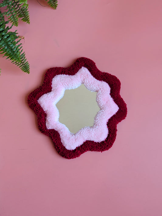 Red and pink coloured wavy pattern tufted yarn mirror