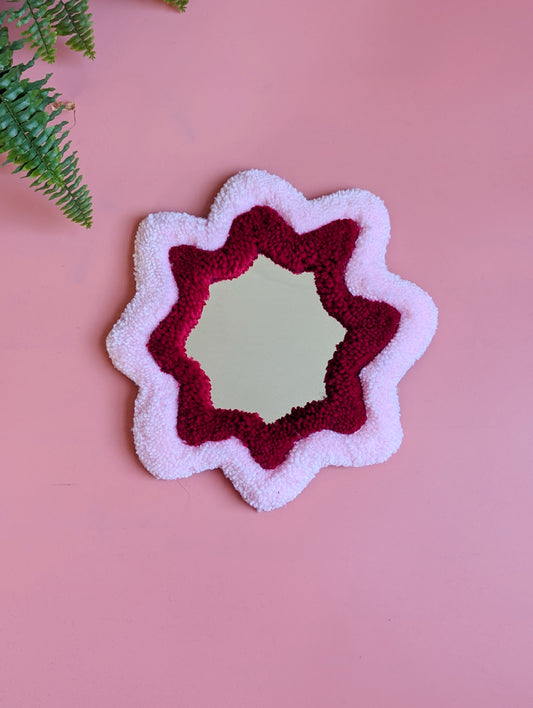 Pink and red coloured wavy pattern tufted yarn mirror