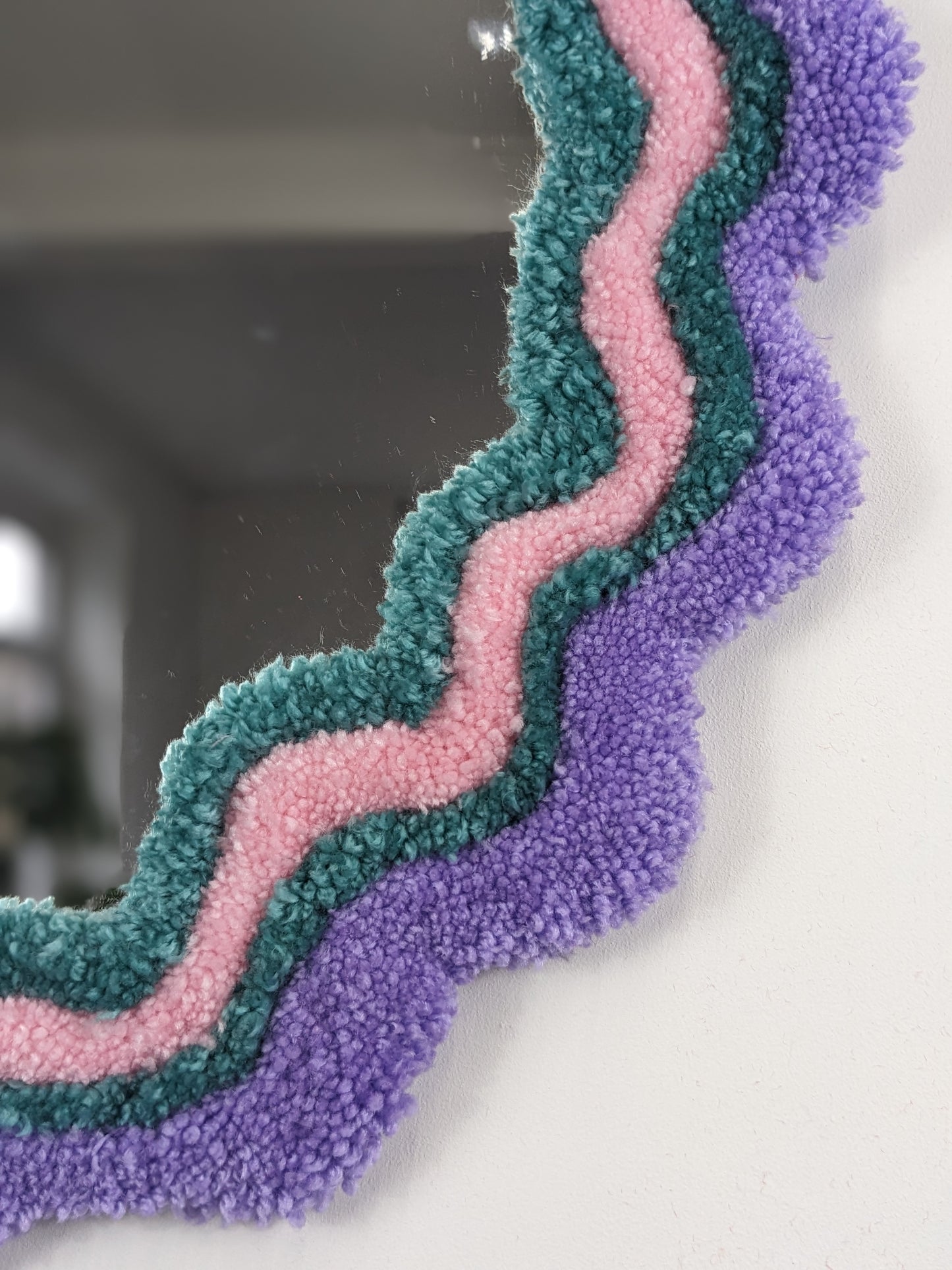 circle pink purple coloured wavy pattern tufted yarn mirror
