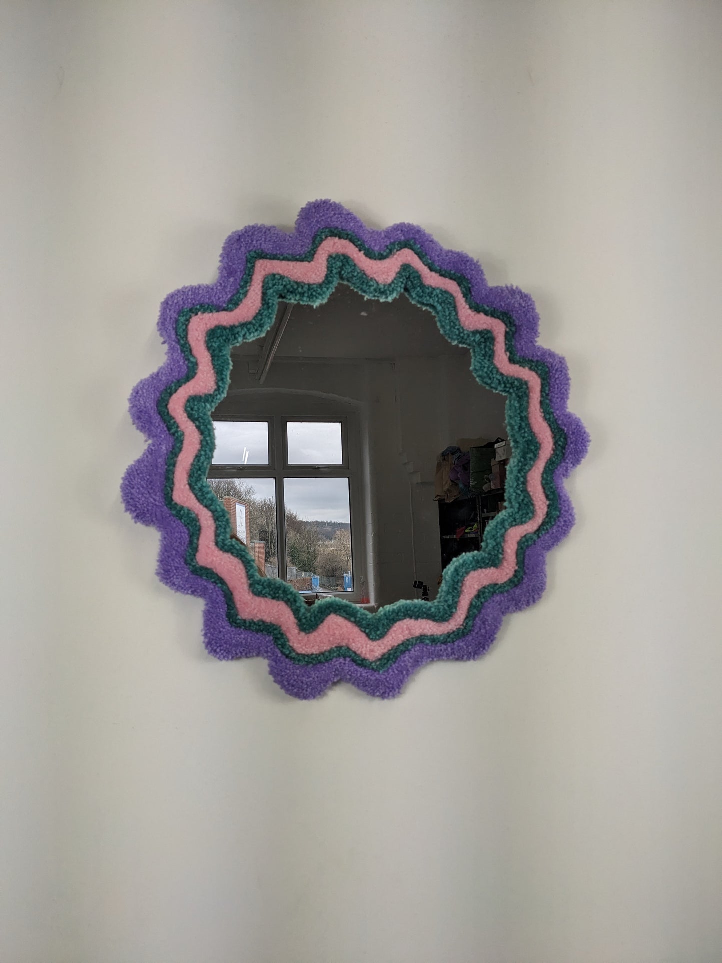 circle pink purple coloured wavy pattern tufted yarn mirror