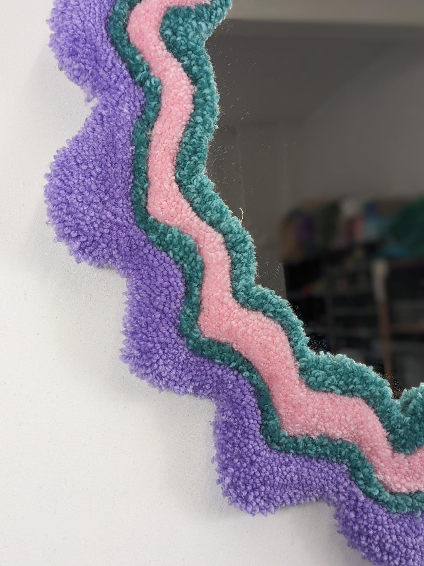 circle pink purple coloured wavy pattern tufted yarn mirror