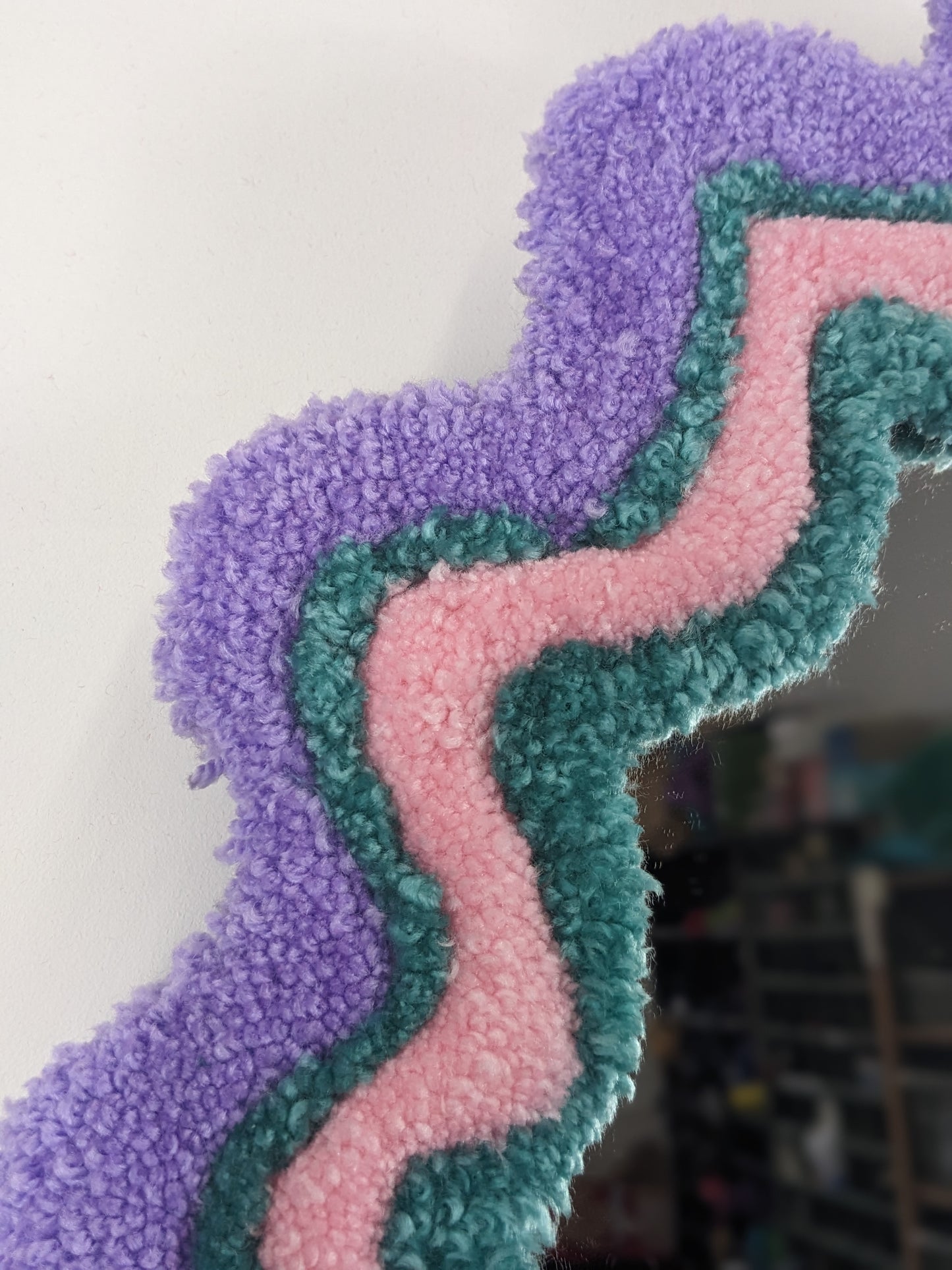 circle pink purple coloured wavy pattern tufted yarn mirror