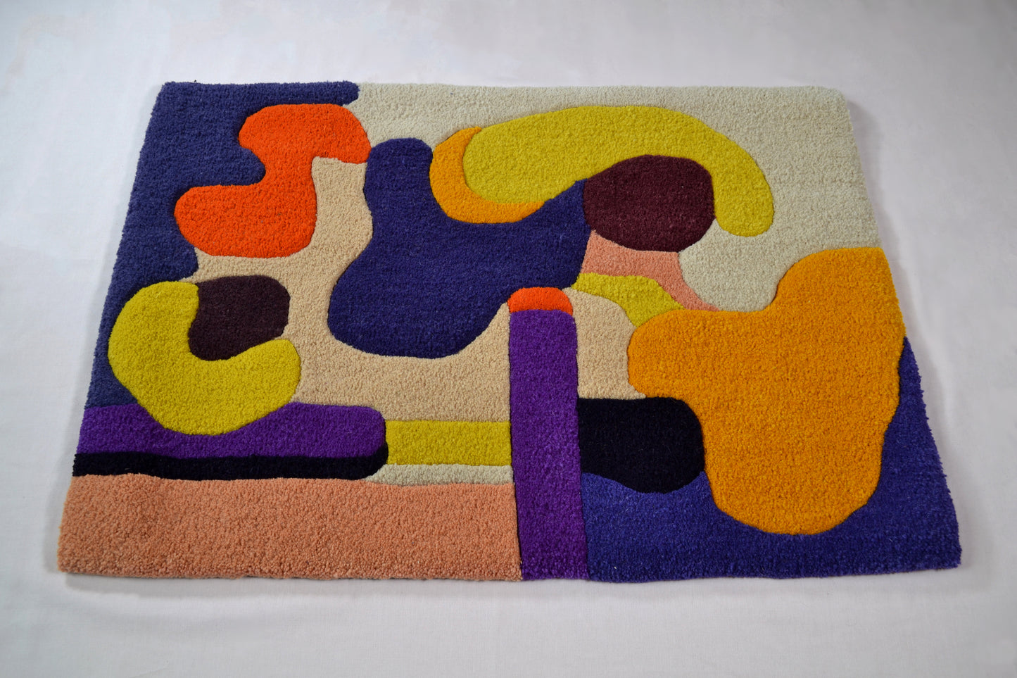 small cream purple abstract handcrafted tufted wool rug