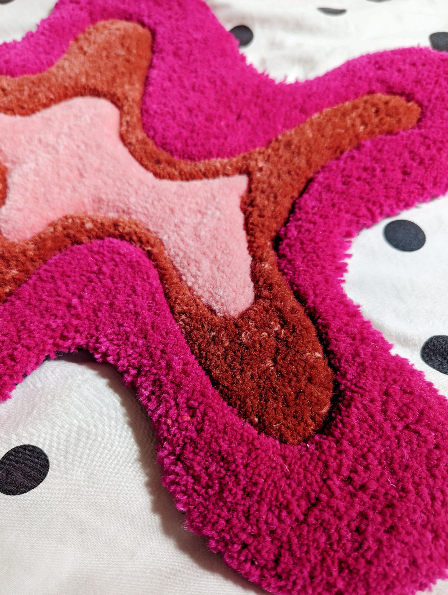 Pink wool tufted splat small rug