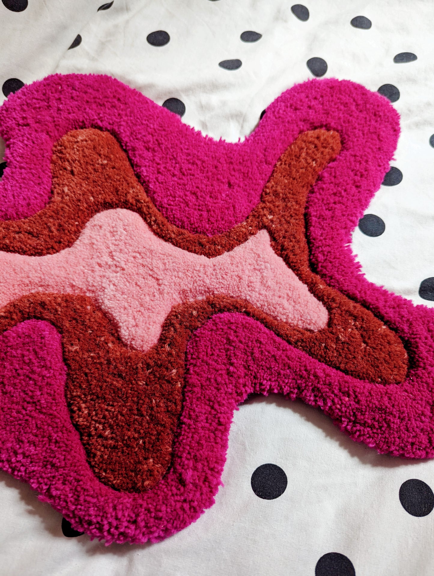 Pink wool tufted splat small rug