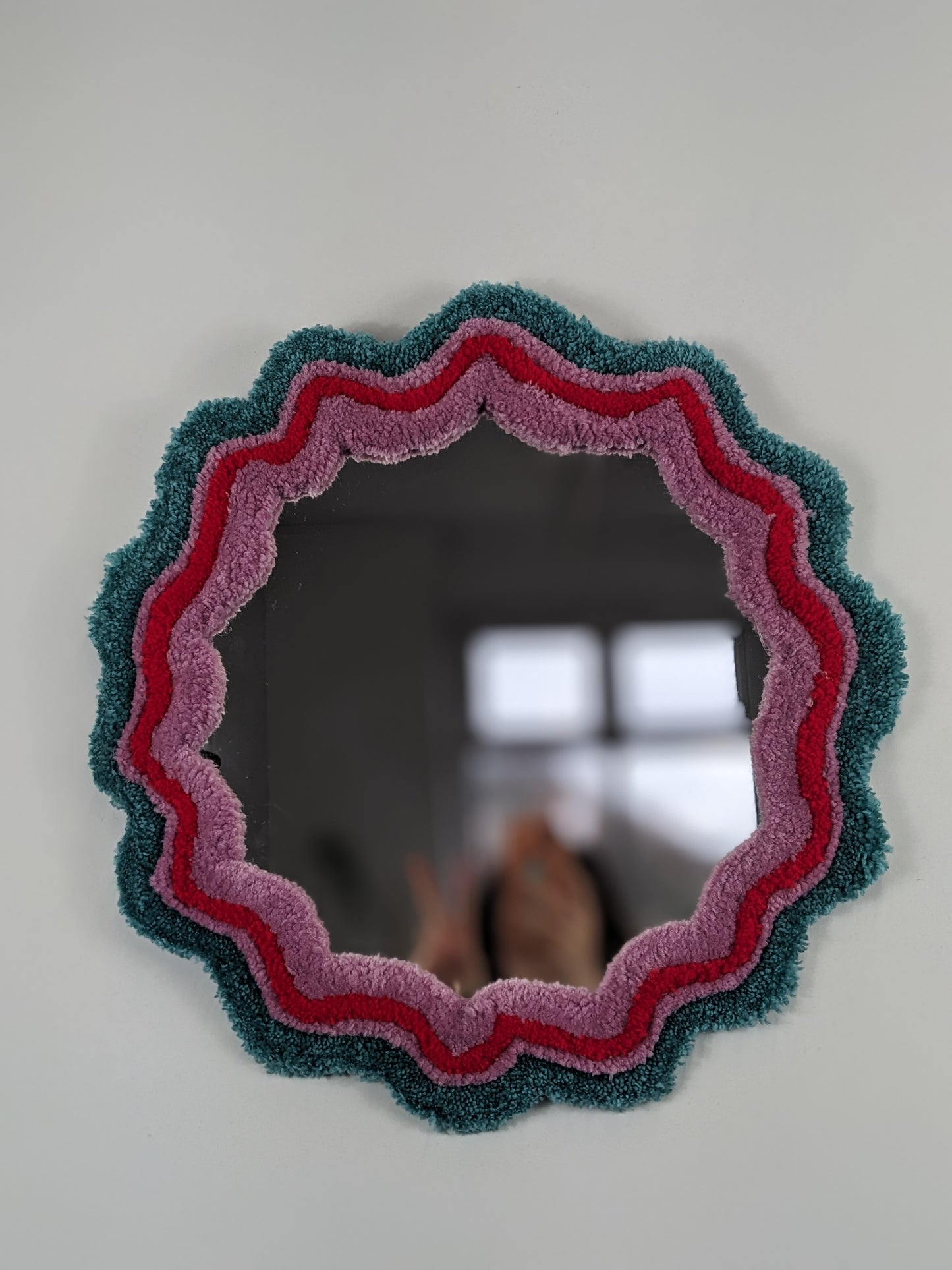 circle red green coloured wavy pattern tufted yarn mirror