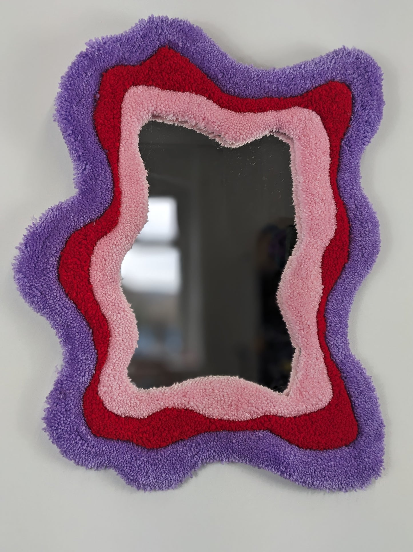 pink red coloured wavy pattern tufted yarn mirror