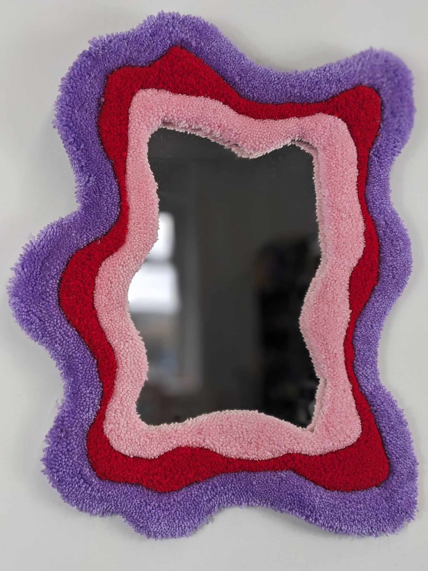 pink red coloured wavy pattern tufted yarn mirror