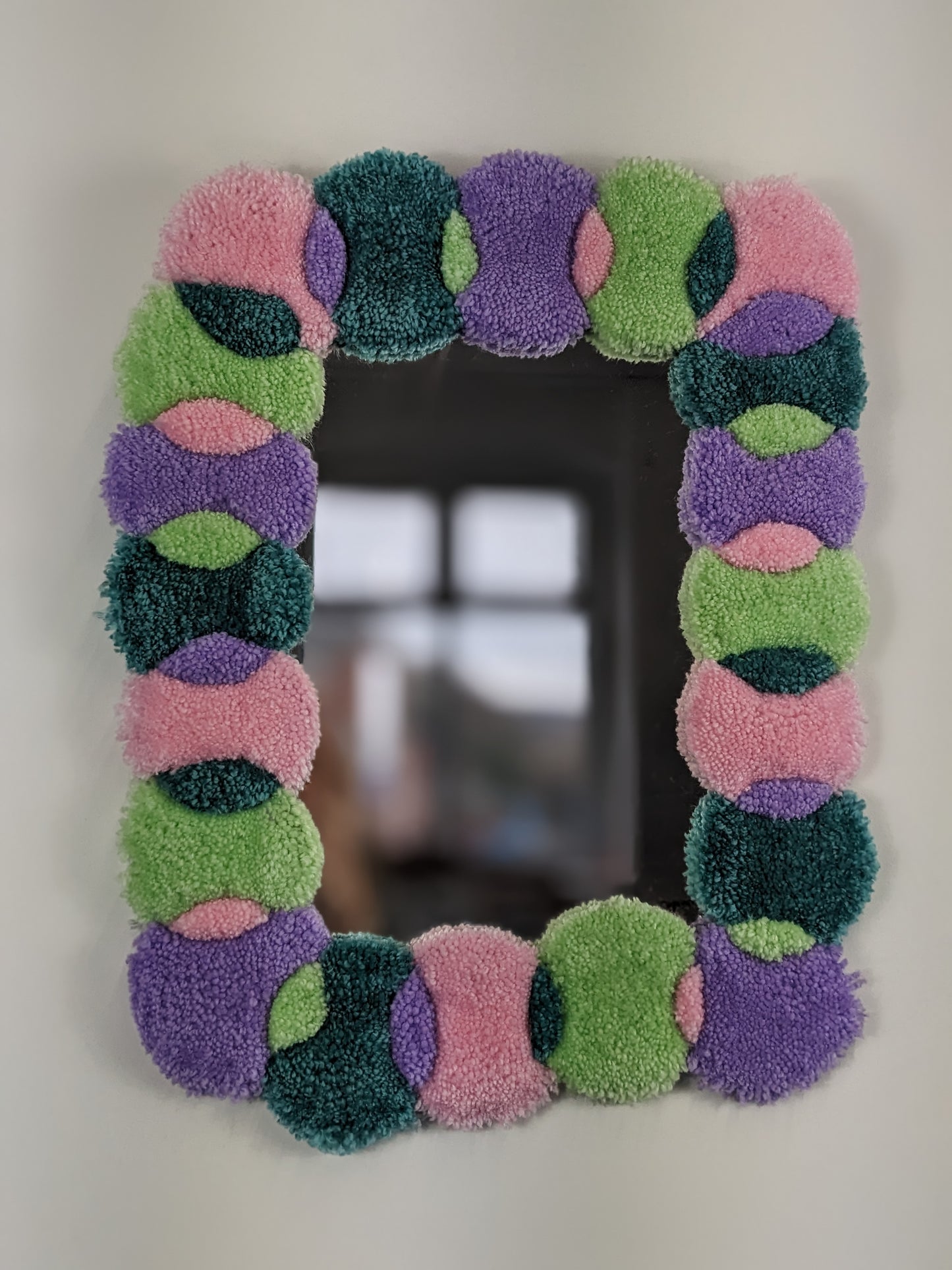 multicoloured pink pastel circle blob shape pattern yarn tufted mirror