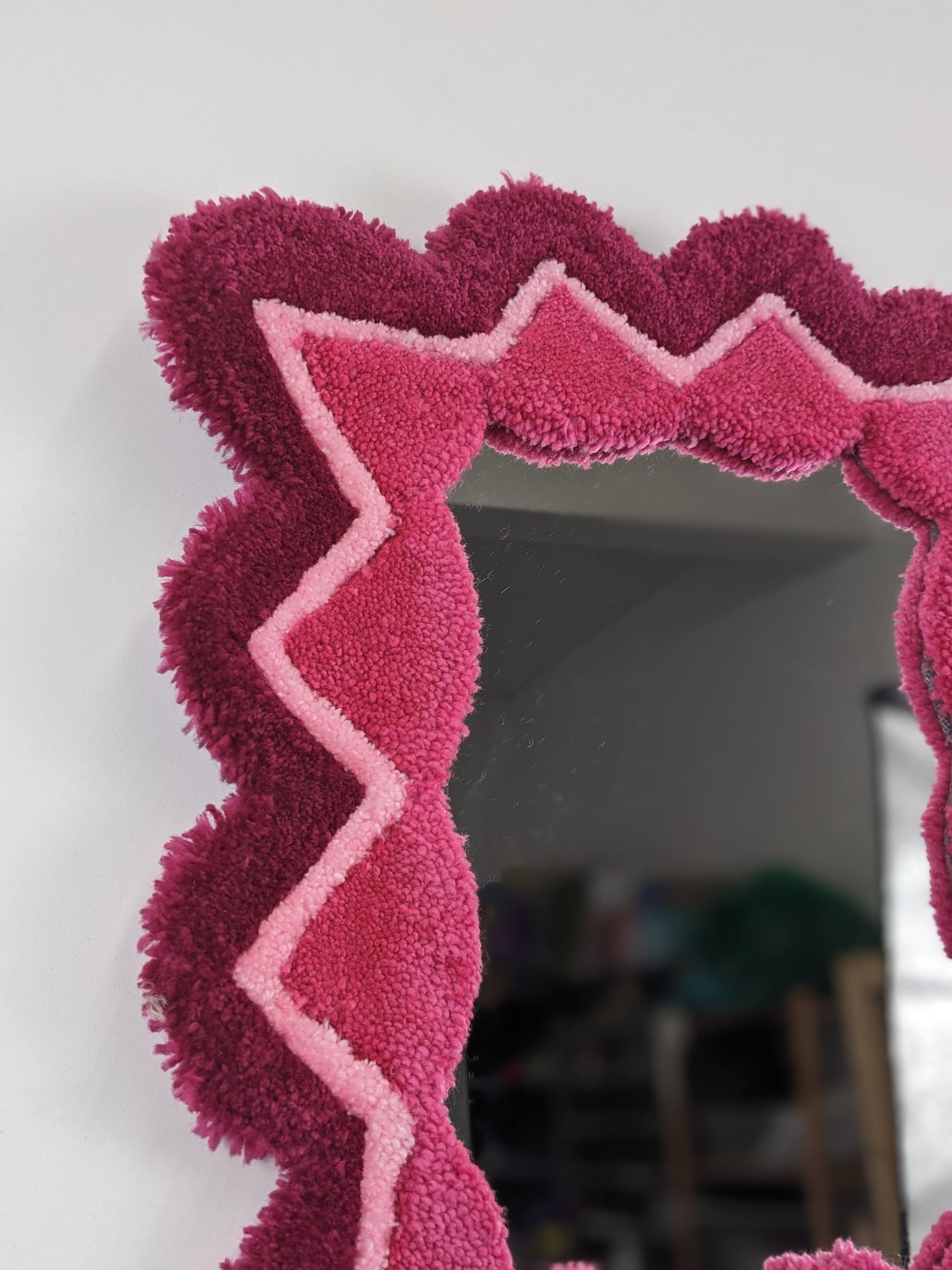 pink coloured zigzag pattern tufted yarn wool mirror