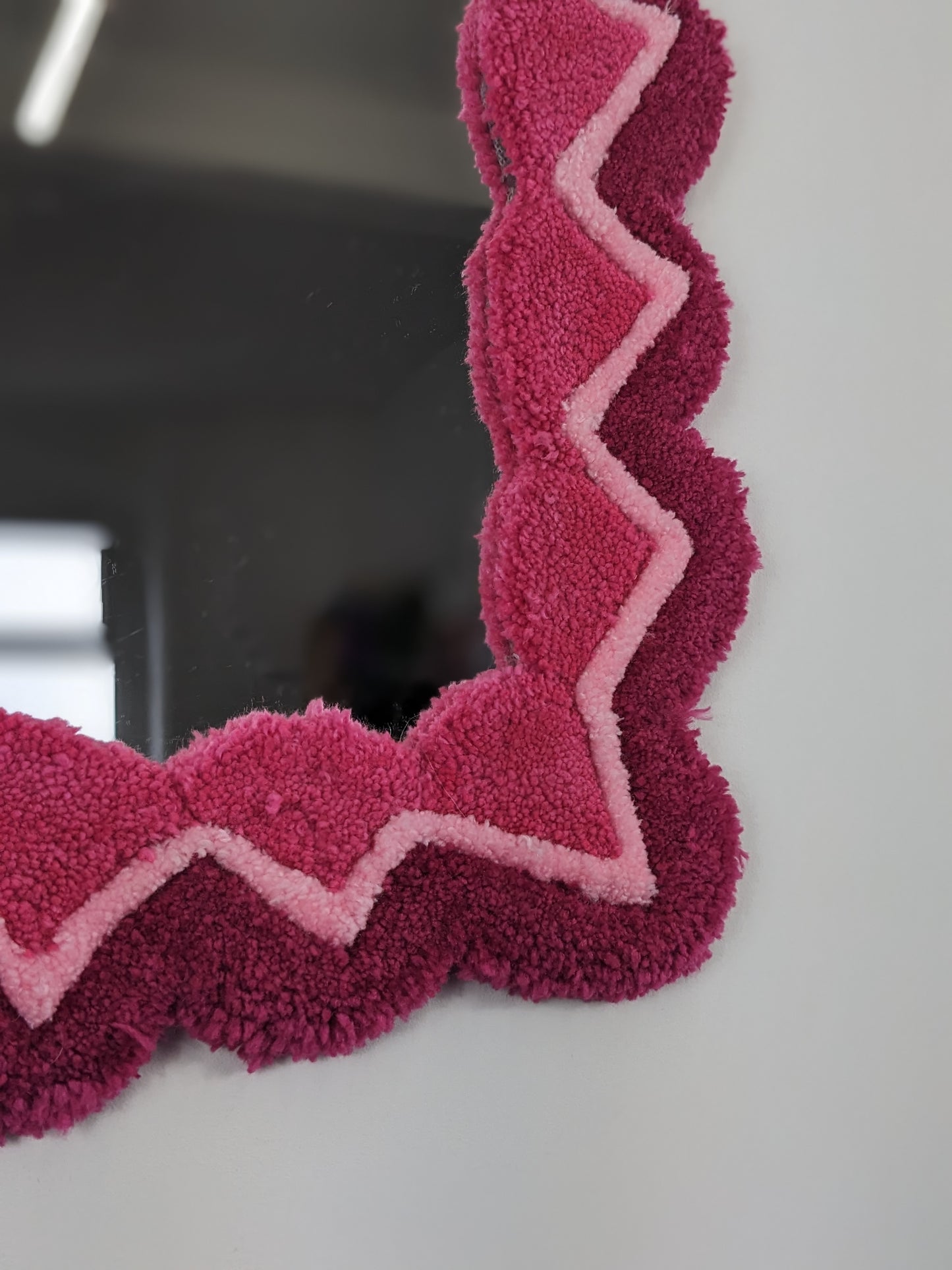 pink coloured zigzag pattern tufted yarn wool mirror