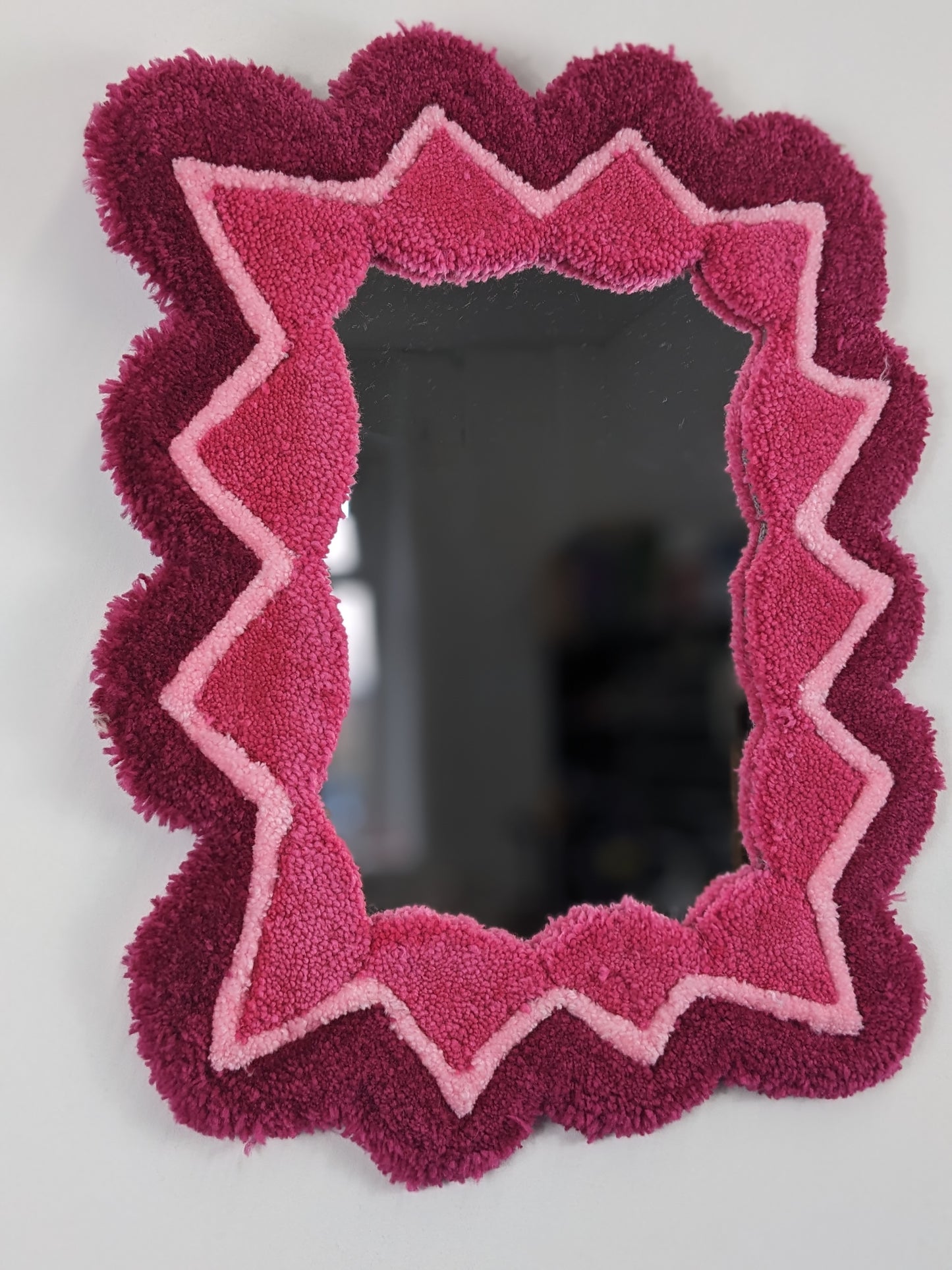 pink coloured zigzag pattern tufted yarn wool mirror