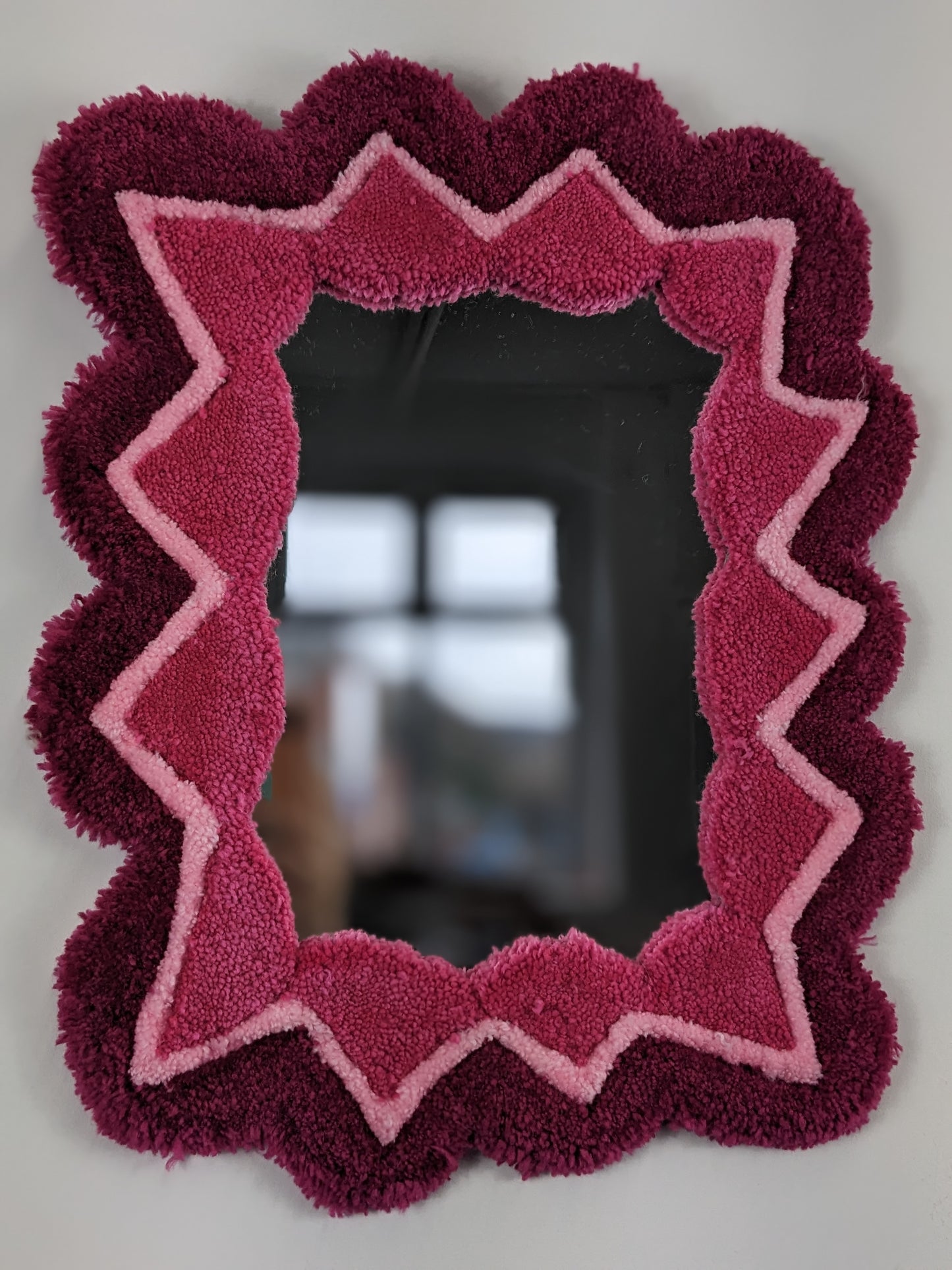 pink coloured zigzag pattern tufted yarn wool mirror