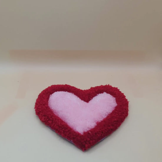 Soft tufted red and pink heart shaped mini rug/coaster 