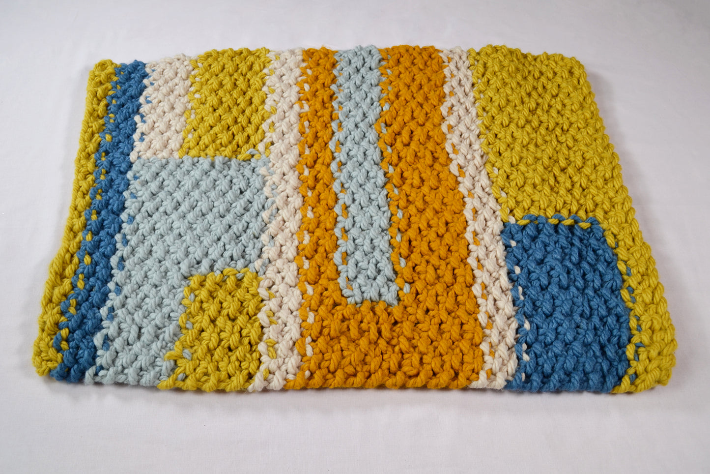 october collection mustard grey hand knitted thick wool small rug